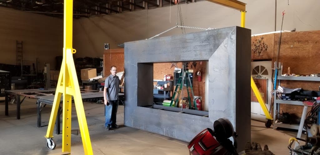 Manuel Rubalcava, owner of M&R Welding, with a finished Corten steel fabrication