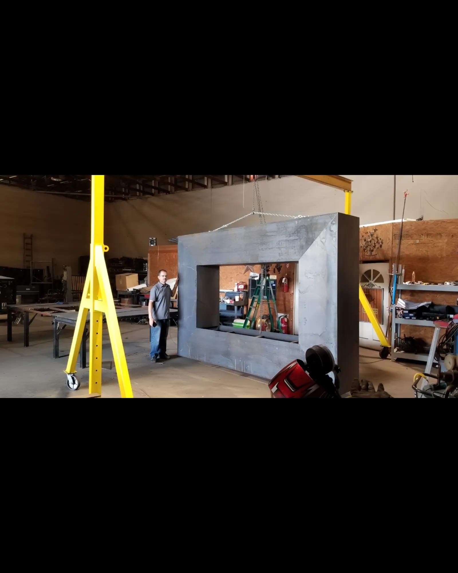 Manuel Rubalcava with a Corten steel fabrication in the M&R Welding shop