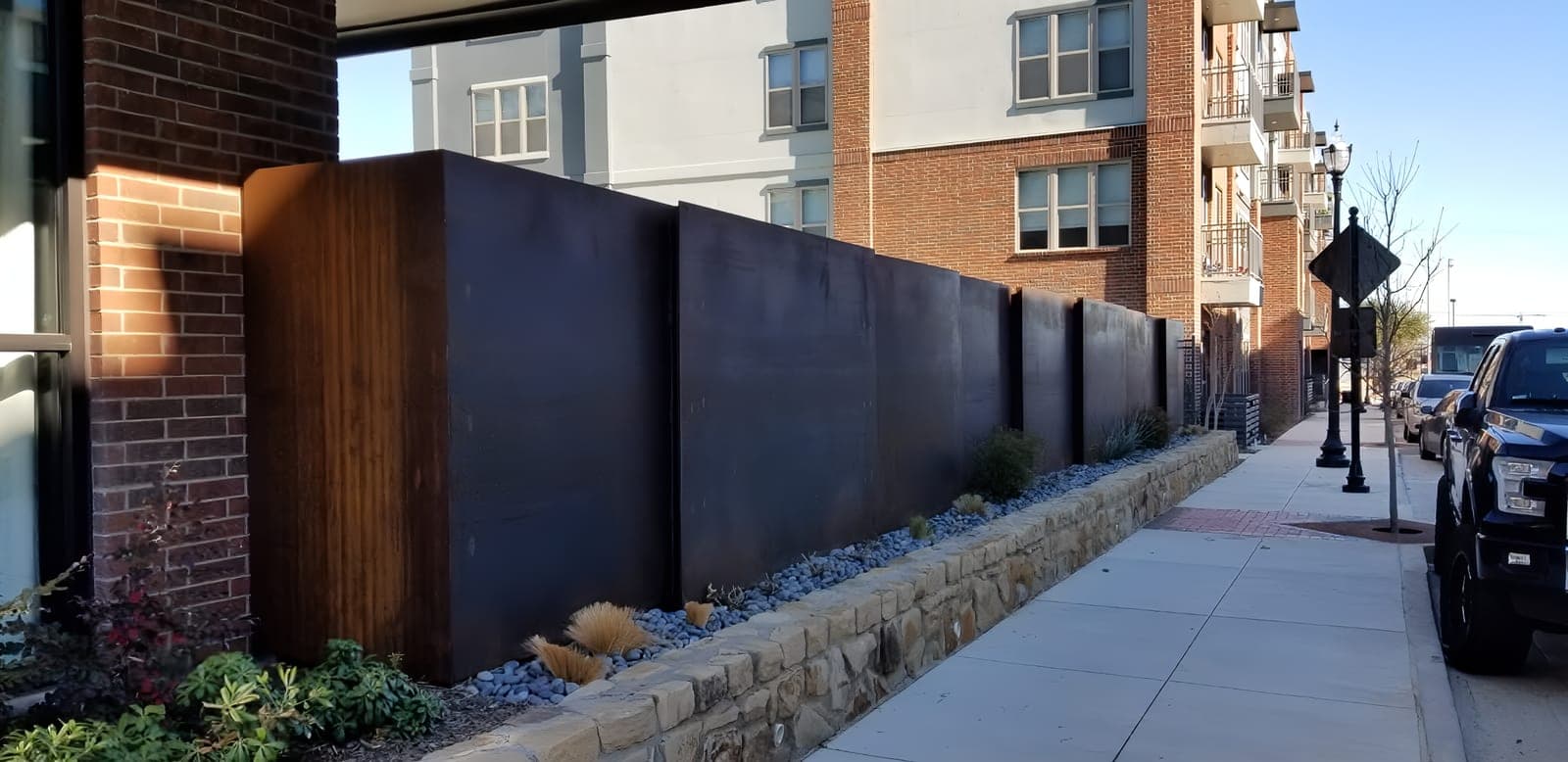 Corten steel patina detail on the Roanoke apartment complex wall